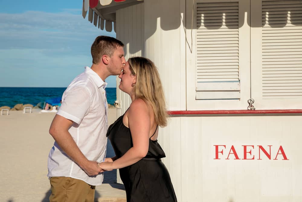 Couple enjoying their engagement proposal captured at Faena Hotel Miami Beach by a professional Miami photographer