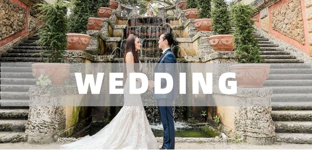 Bride and groom sharing a joyful moment, professionally photographed on their wedding day.