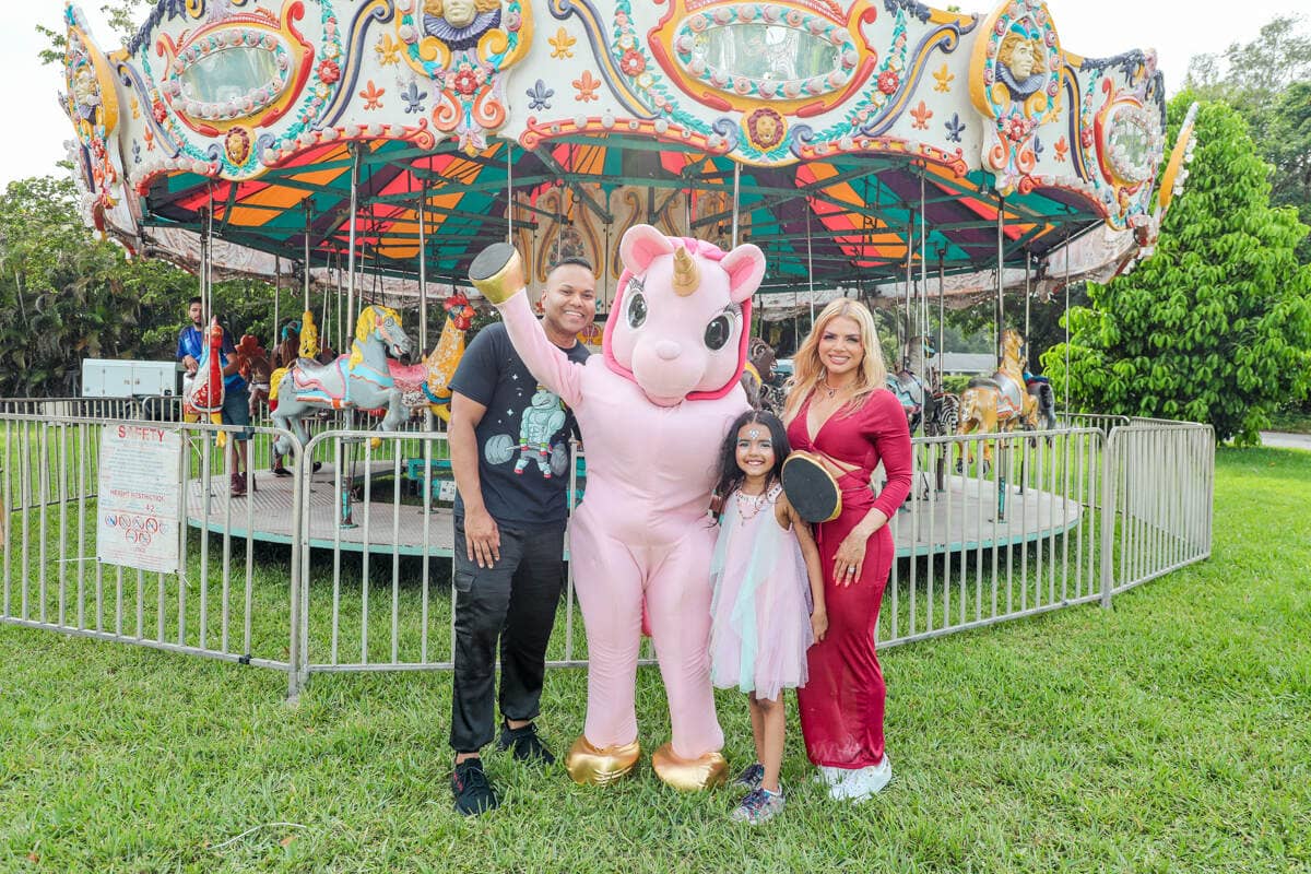 Happy family celebrating a kid’s birthday party in Miami, captured by a professional photographer