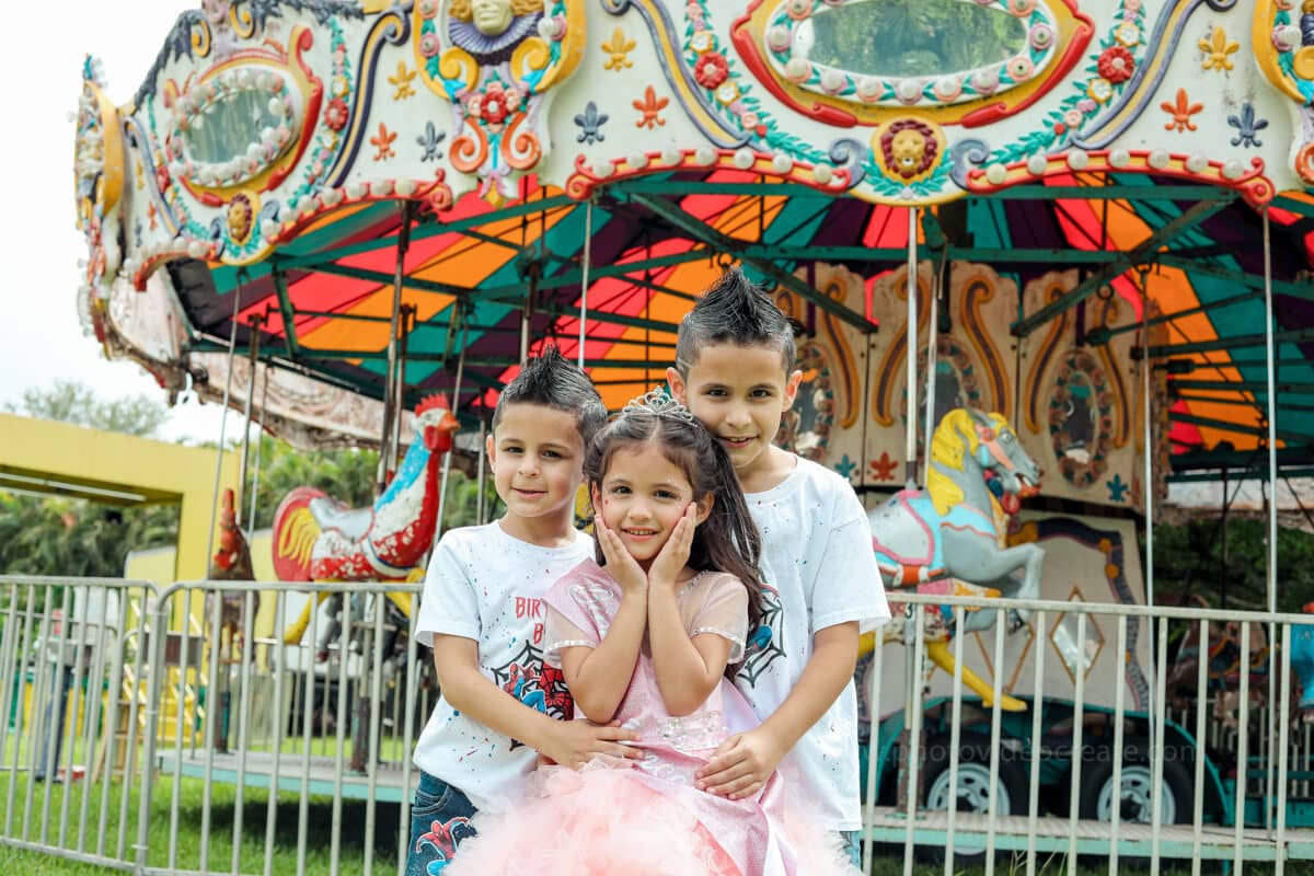Joyful kids and family celebrating a birthday party, captured by a Miami photographer