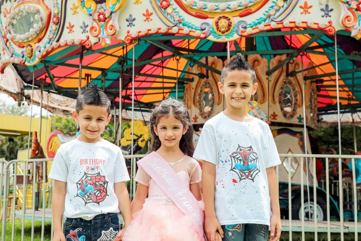 Happy kids and family enjoying a birthday party, captured by a Miami photographer