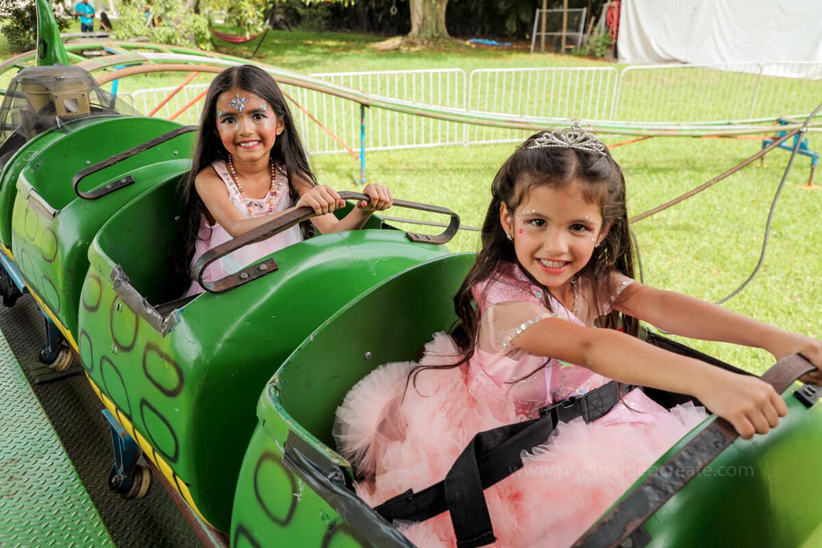 Joyful kids and family enjoying a birthday party, captured by a Miami photographer
