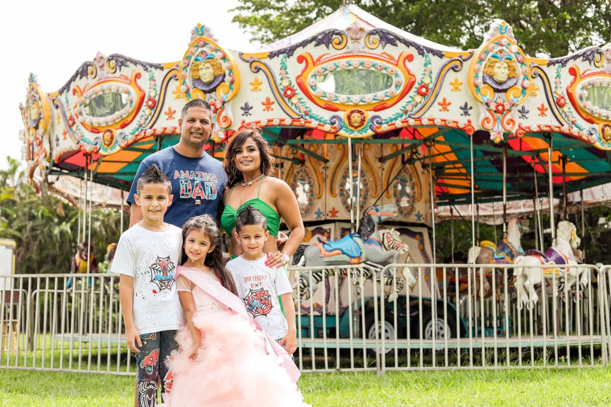 Happy kids and family enjoying a birthday party, captured by a Miami photographer