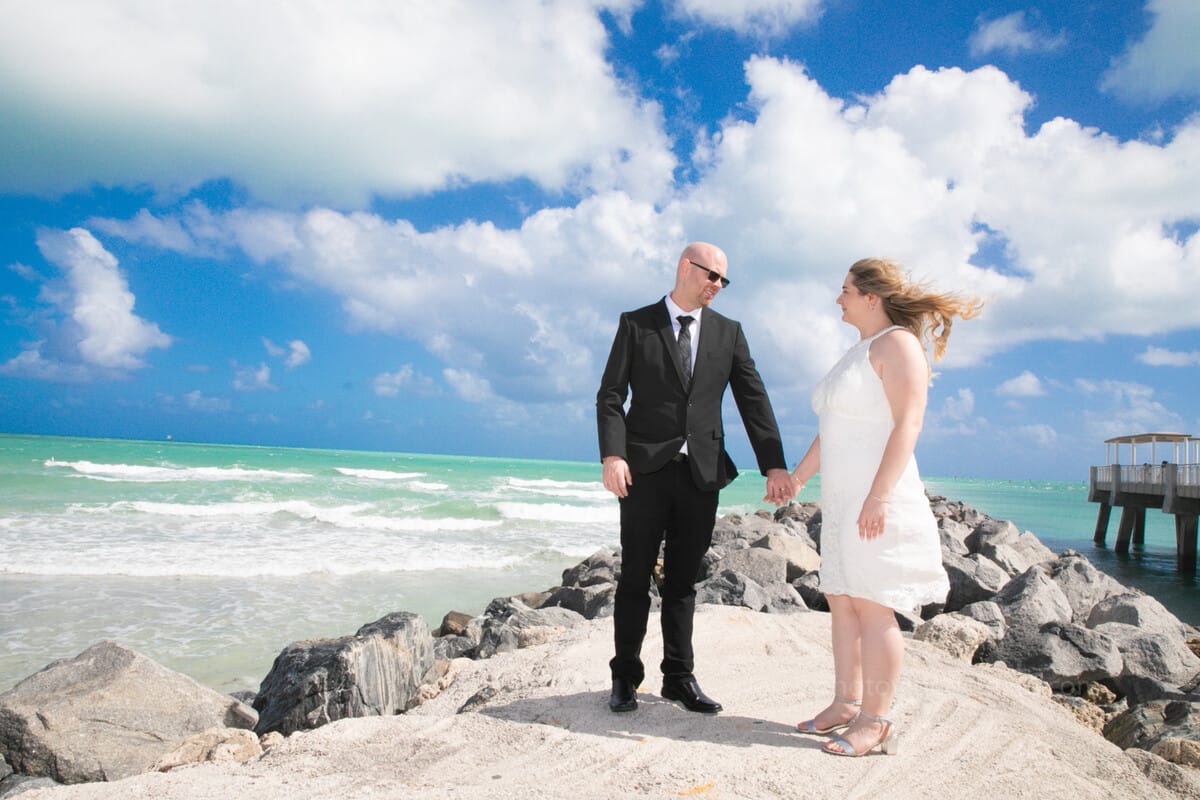 Intimate wedding moment captured outside Miami Beach City Hall by a Miami photographer