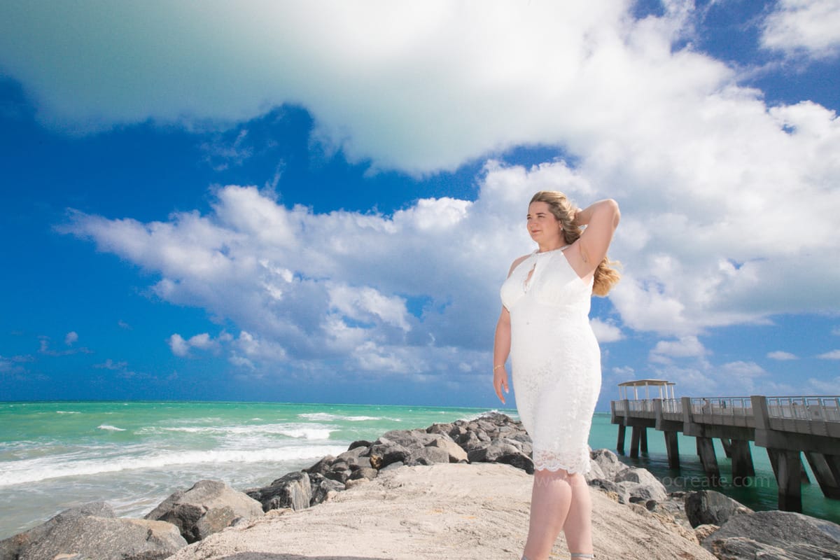 Classic wedding portrait of a couple at Miami Beach City Hall, captured by a Miami photographer