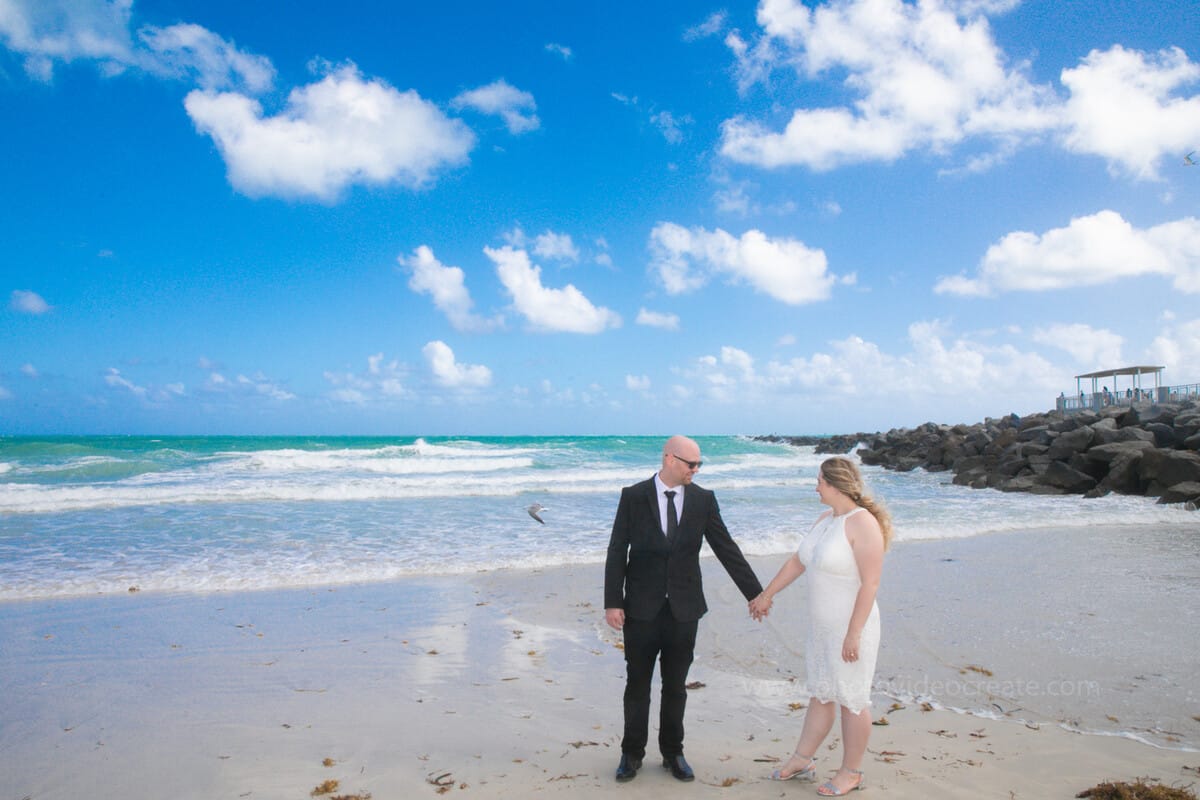Romantic moment between bride and groom during their City Hall wedding in Miami Beach, captured by a Miami photographer