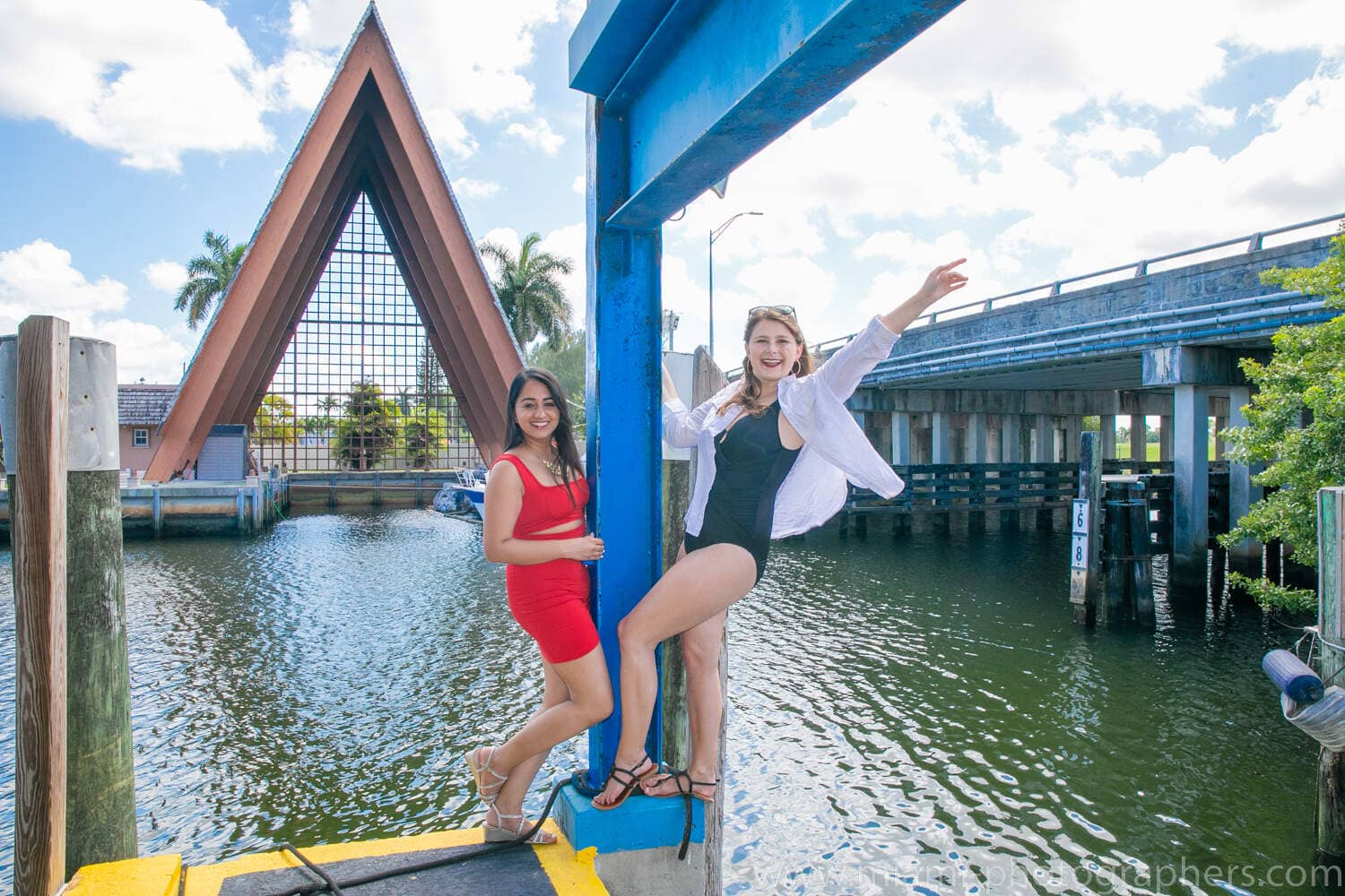 Bride-to-be raising a toast with her friends during a lively bachelorette party on a yacht in Miami, captured by a professional photographer