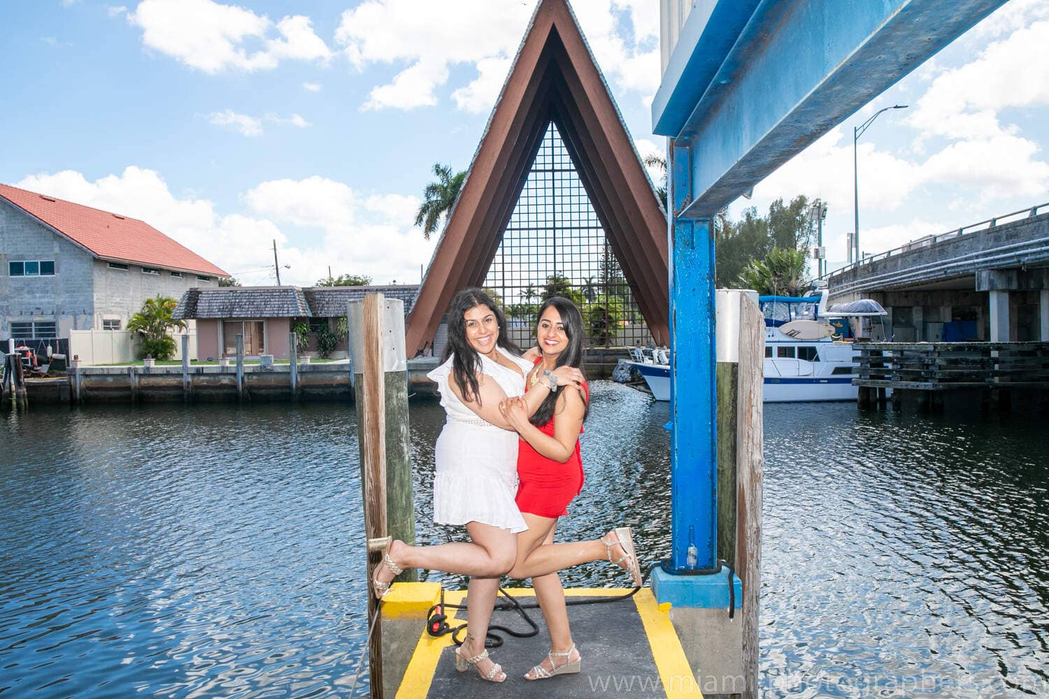 Bride-to-be and her friends having fun together on a yacht during a Miami bachelorette party, captured by a professional photographer