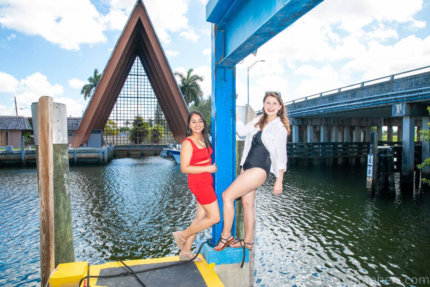 Group of friends having fun and enjoying the Miami yacht ride during a bachelorette party, captured by a professional photographer