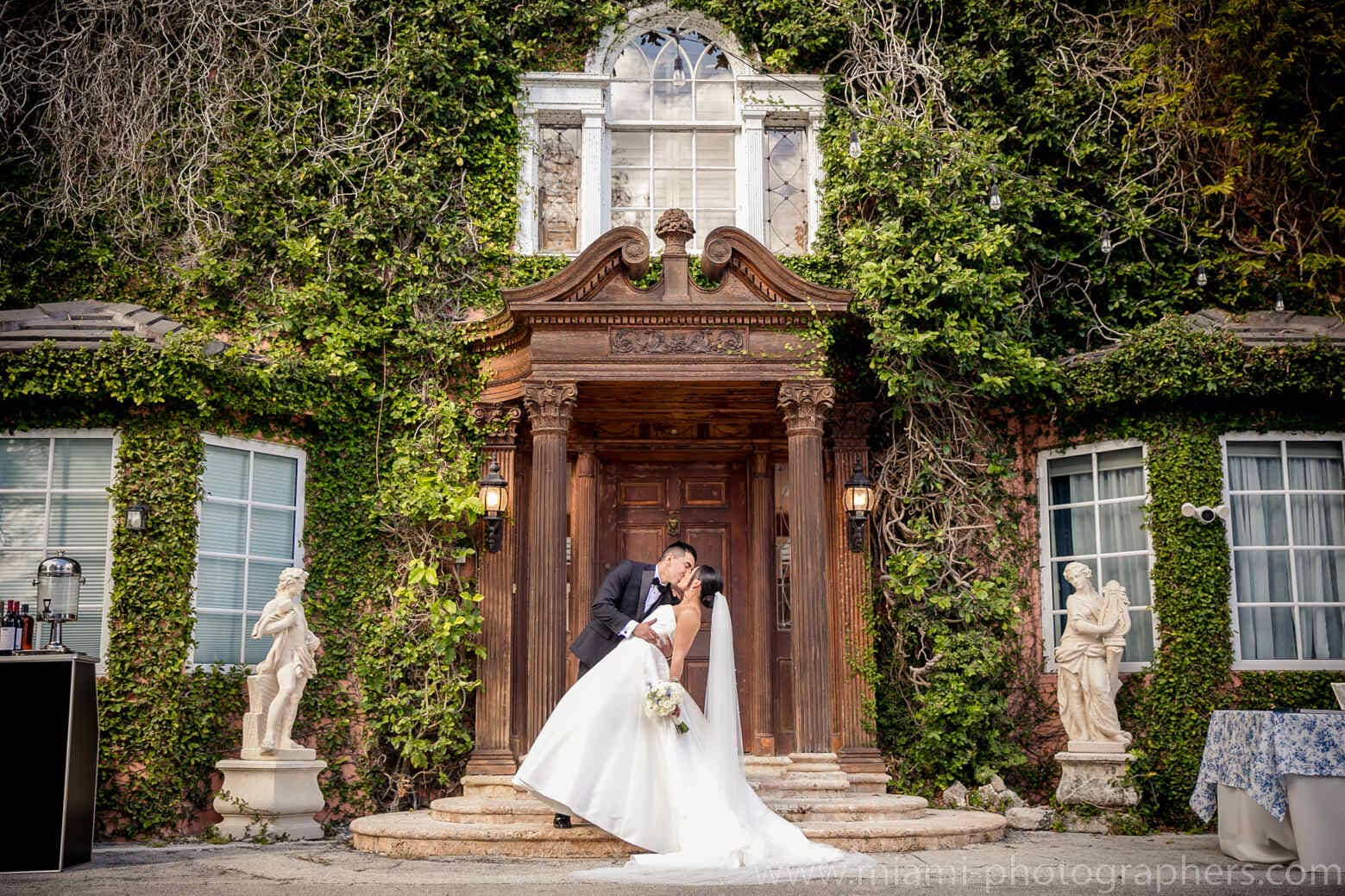 Bride and groom Roxana and Andres sharing a romantic moment during their elegant Miami wedding, captured with soft natural light and graceful details.