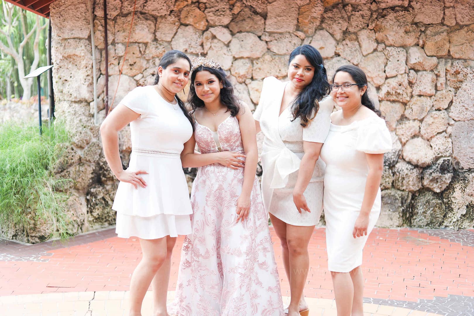 Young woman celebrating her Quinceañera at Pinecrest Gardens in Miami, captured by a professional photographer