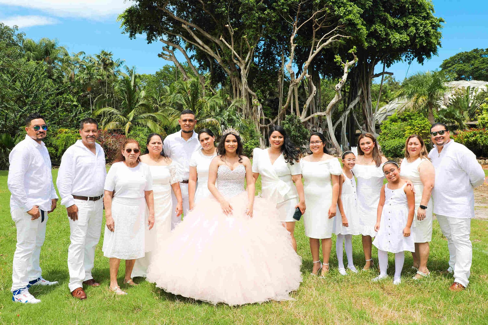 Beautiful young woman celebrating her Quinceañera at Pinecrest Gardens in Miami, professionally photographed