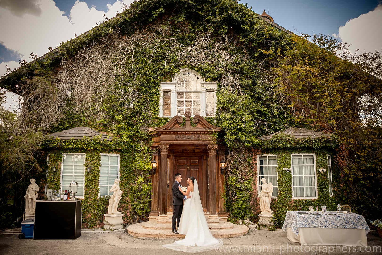 Bride and groom Roxana and Andres sharing a heartfelt, romantic moment during their Miami wedding, captured in soft natural light with elegant styling.