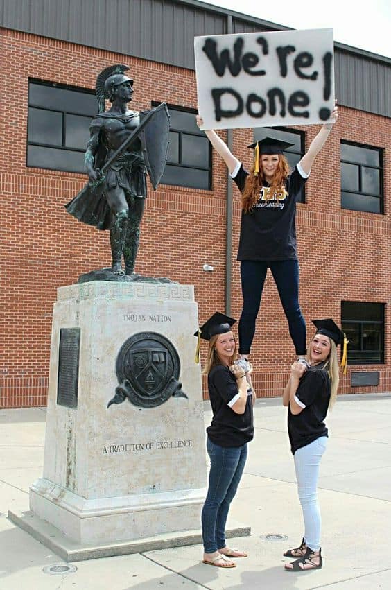 9 Creative Graduation Photoshoot Ideas 2024 For Memorable Day 20 graduation pictures holding sign