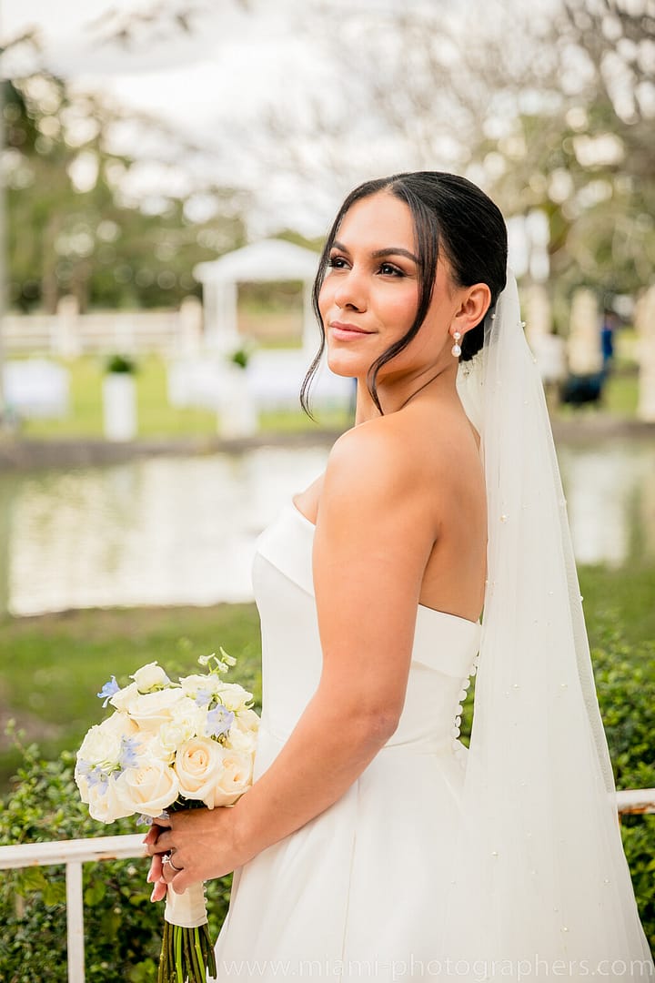 Bride and groom Roxana and Andres sharing an intimate moment during their Miami wedding, captured with soft lighting and elegant surroundings.