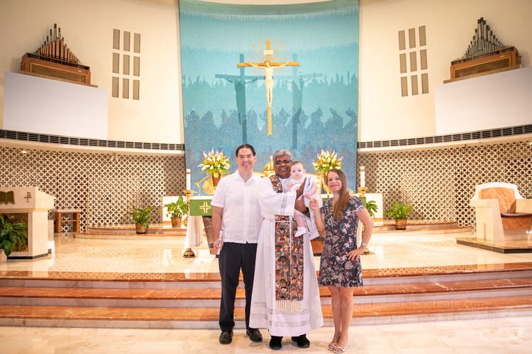 Baptism ceremony at St. Rose of Lima Church in Miami photographed by a local professional