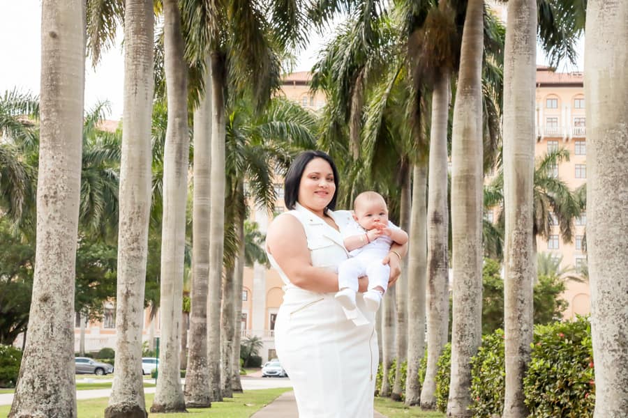 Close-up of baby held during baptism ceremony at Coral Gables United Church of Christ in Miami