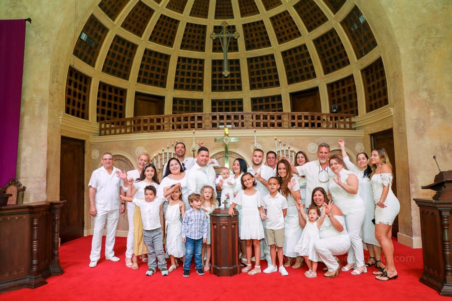 Close-up of baptismal font and holy water during baptism ceremony at Coral Gables United Church of Christ in Miami