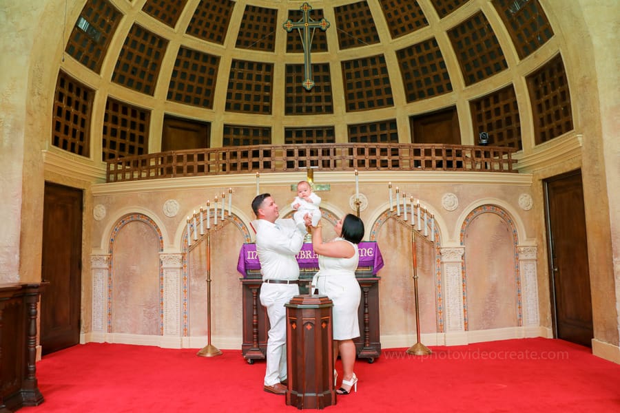 Emotional moment during a baptism ceremony at Coral Gables United Church of Christ, captured by a Miami photographer.